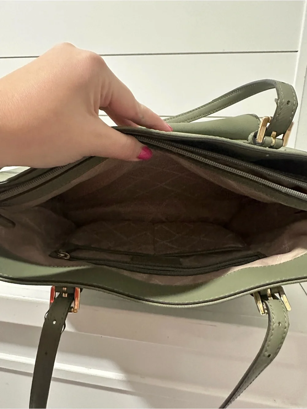 Michael Kors discoloration secure noted
