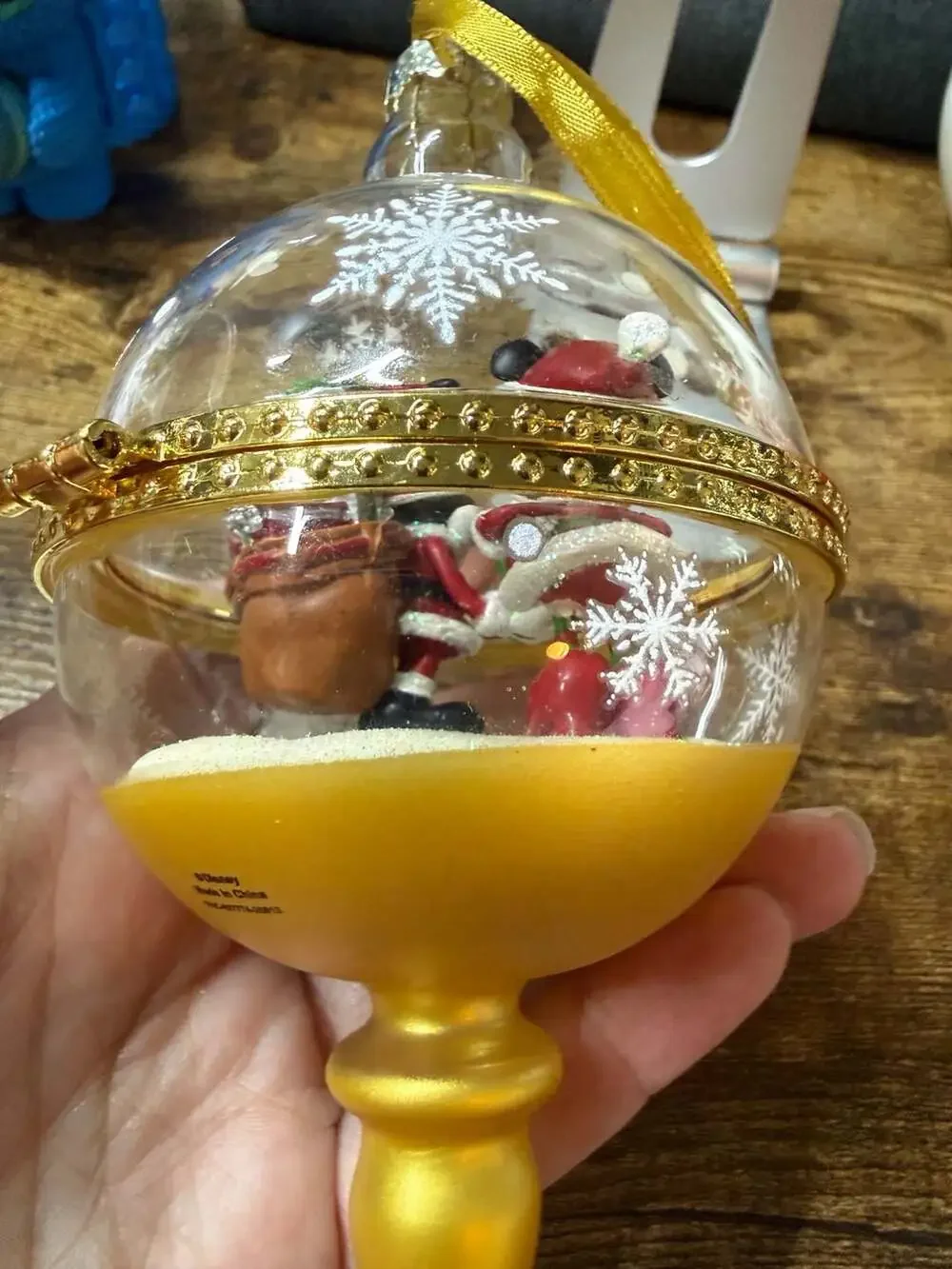 Disney glass ornament opens