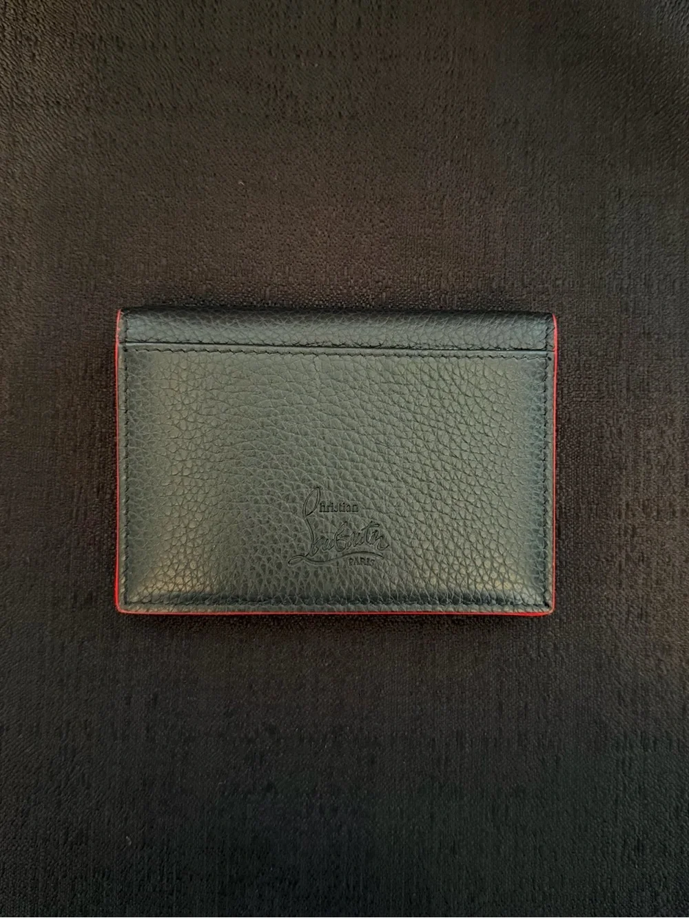 Christian Louboutin it features