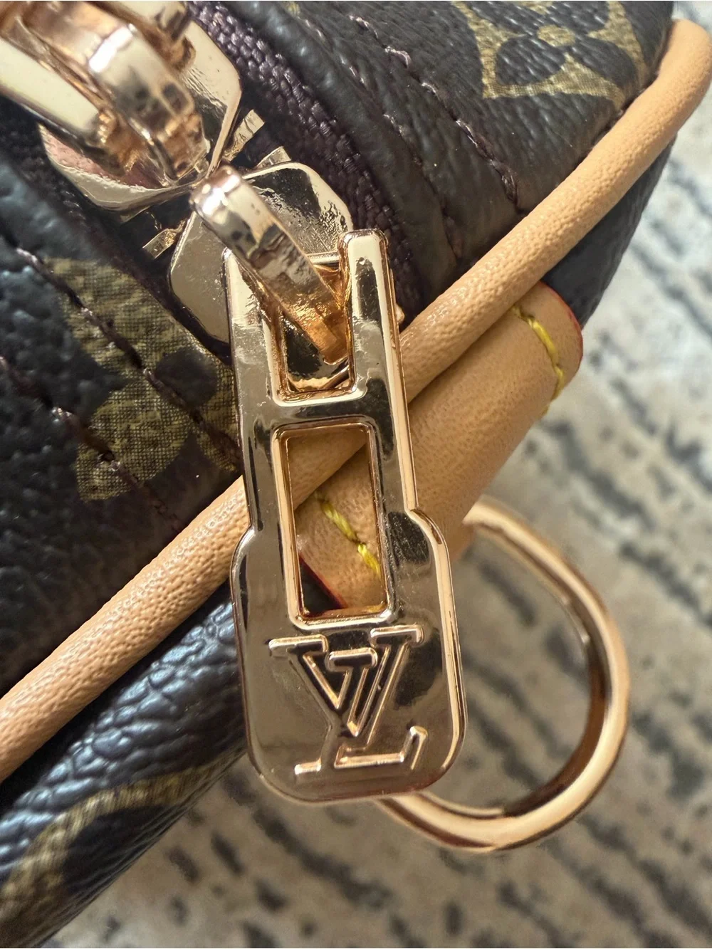 Louis Vuitton Brown Monogram Handbag with Gold Trim