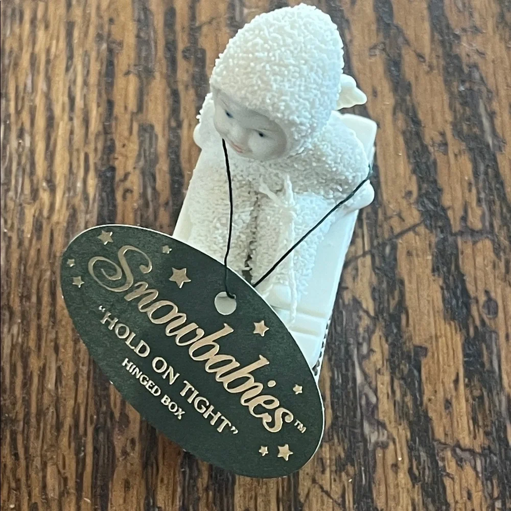 Snow babies Department 56 tight hold