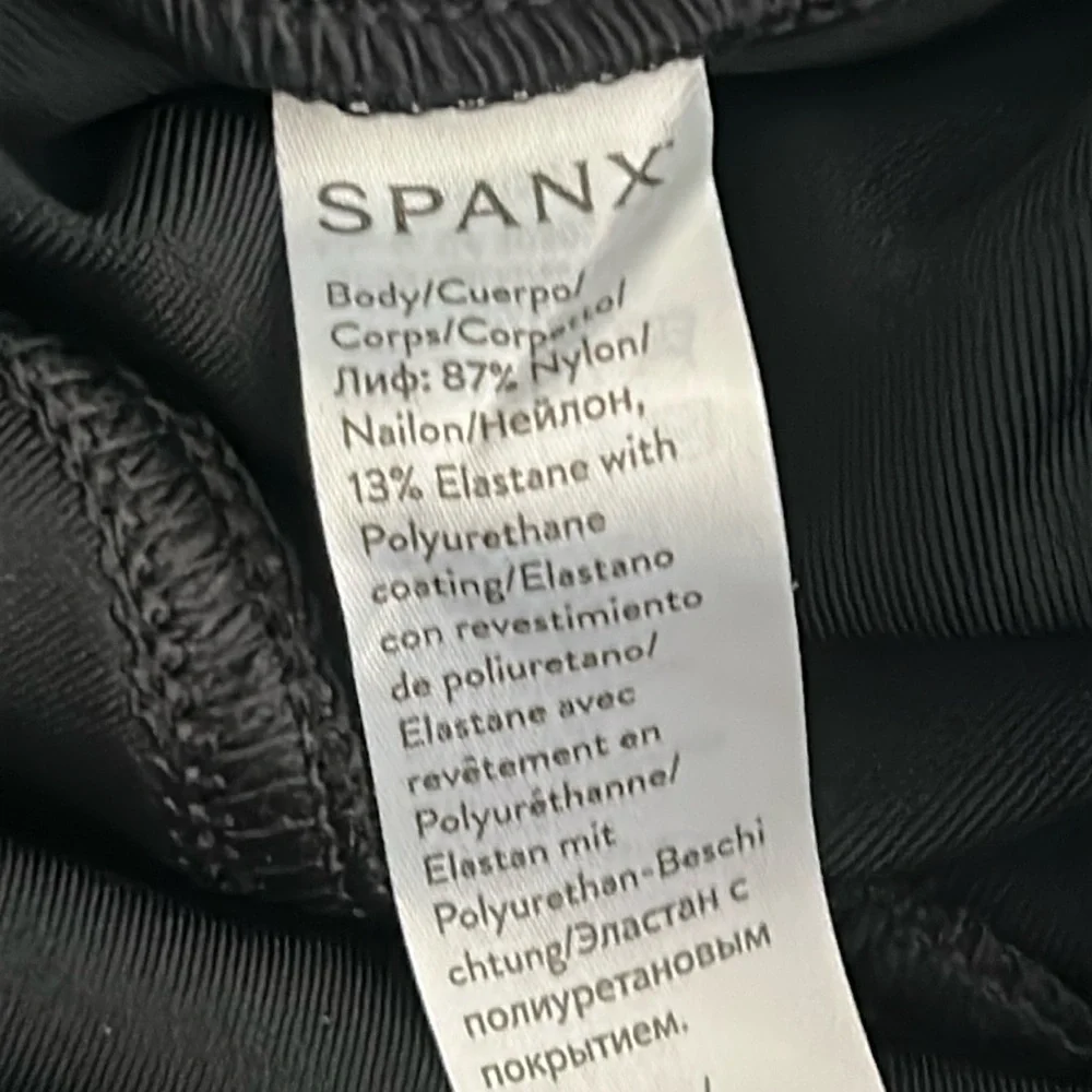 NWT Spanx black leather faux leggings, women’s size medium.