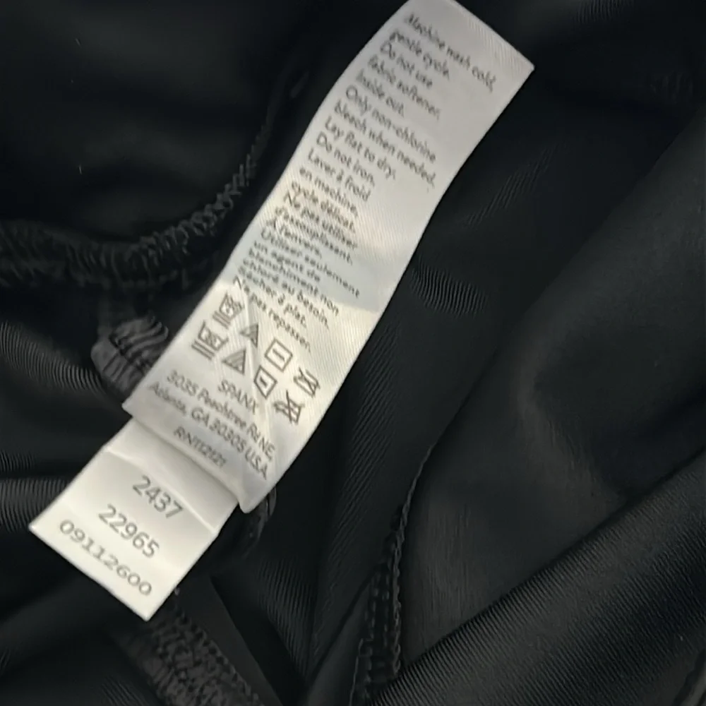 NWT Spanx black leather faux leggings, women’s size medium.
