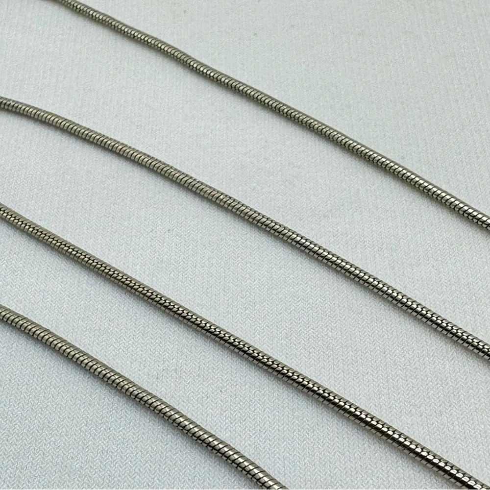Unsigned silver tone