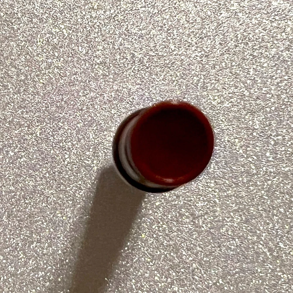 Tarte Maracuja Juicy Burgundy Lip Balm Gloss. Color Burgundy.