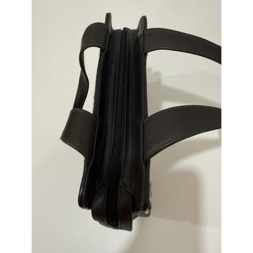 Carlos Falchi wear some drop