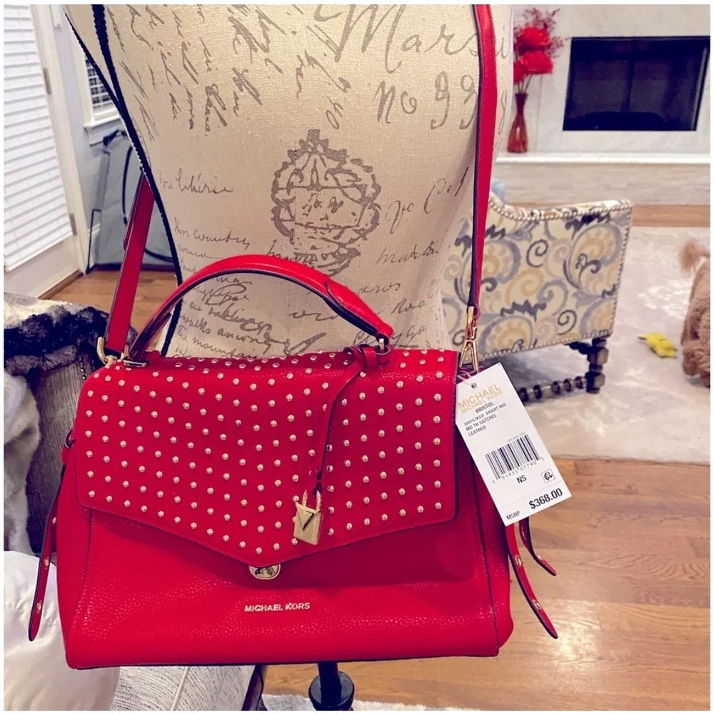 Michael Kors command attention