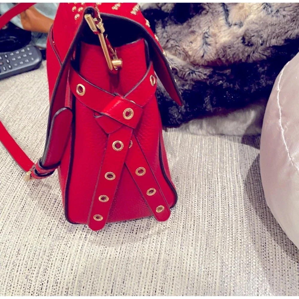 Michael Kors command attention
