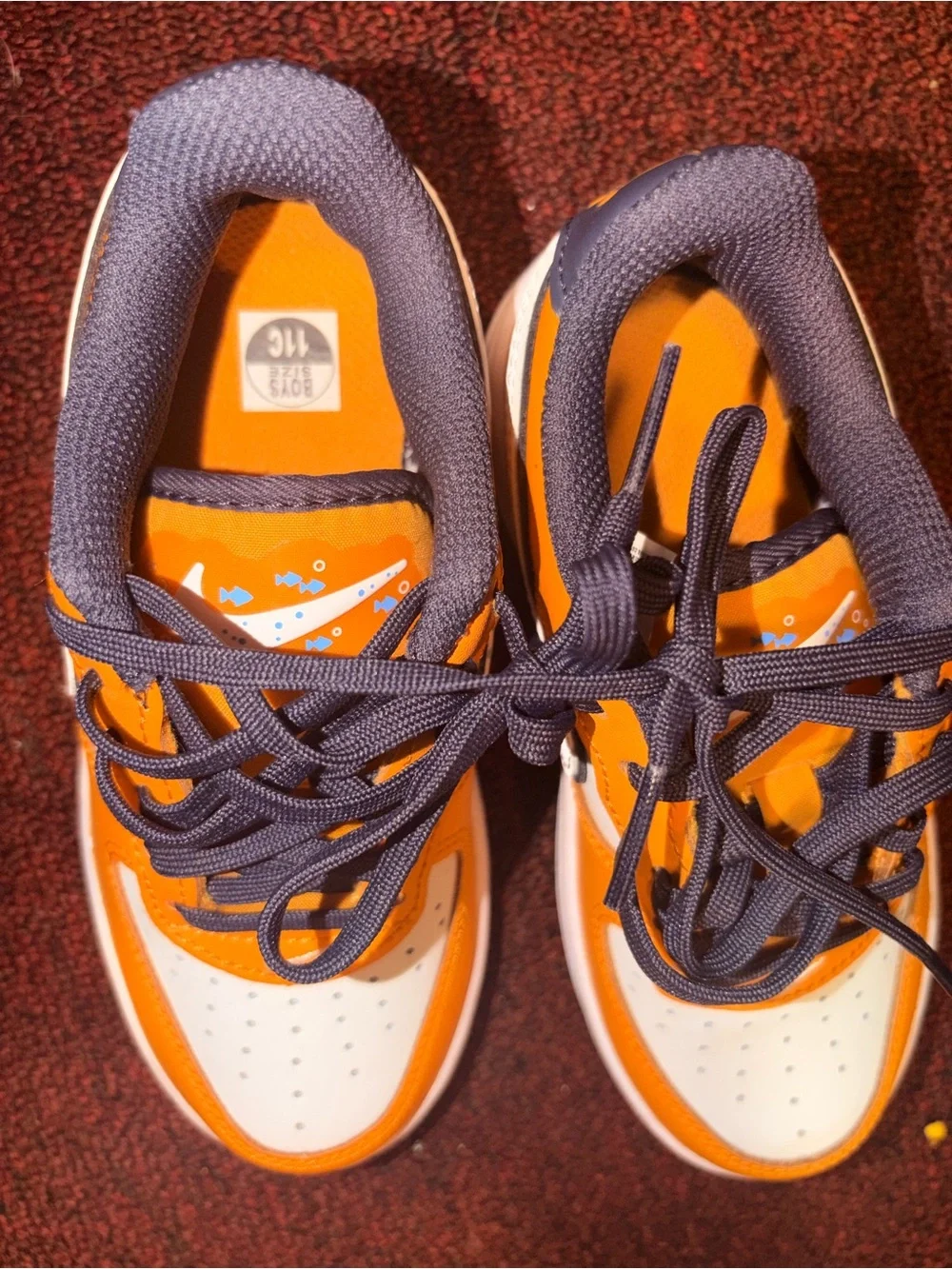 Nike Kids Orange and Gray Low-Top Sneakers with Smiley Heel