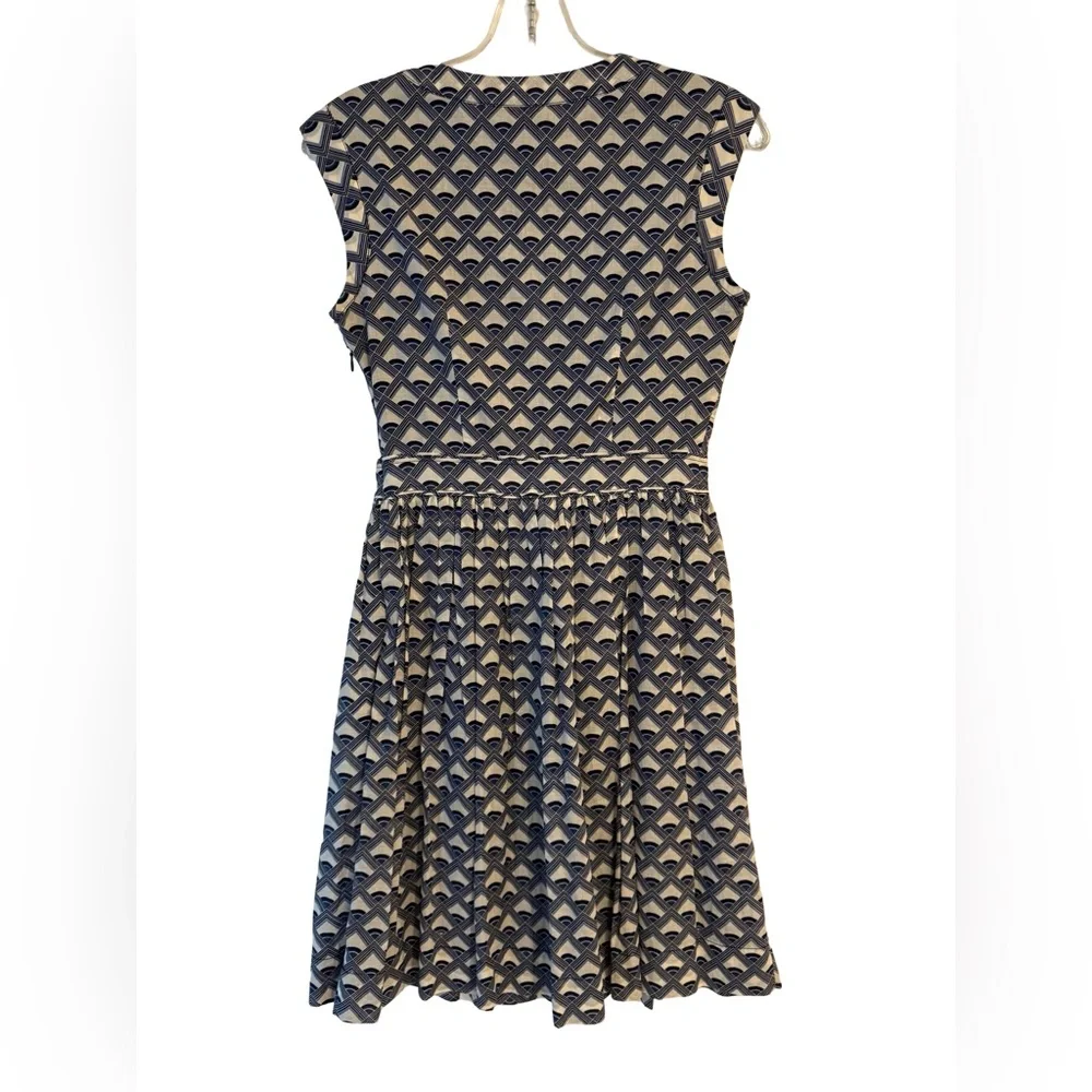 Tory Burch •	tory burch