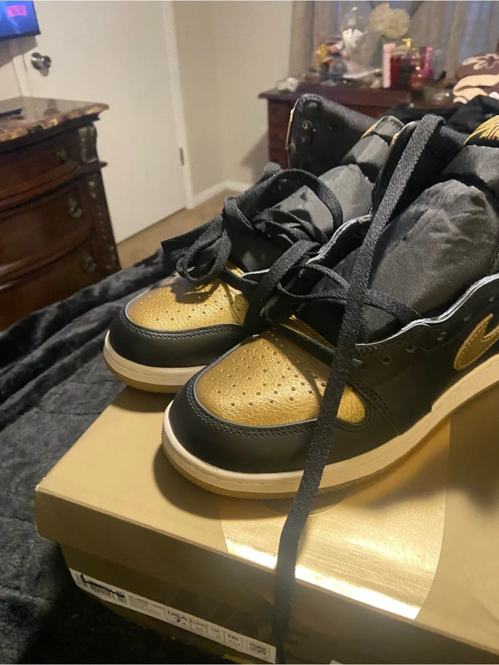 Nike Air Jordan 1 Mid Black & Metallic Gold Sneakers