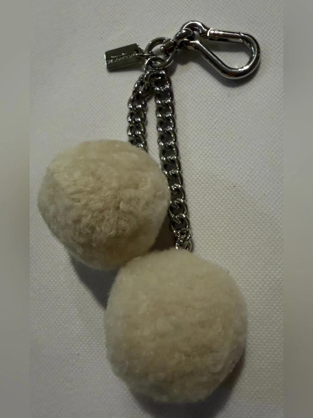 Coach Cream Pom Pom Keychain with Silver Chain