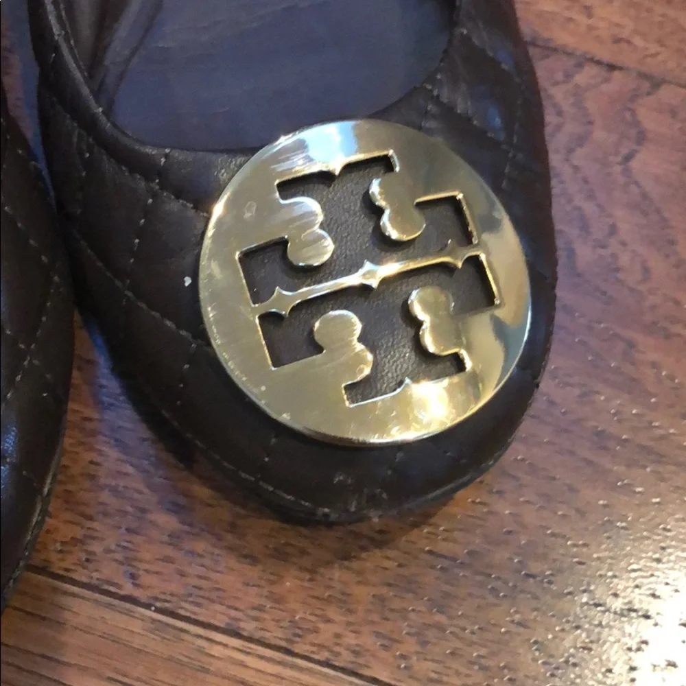 Tory Burch gold rounded prominent