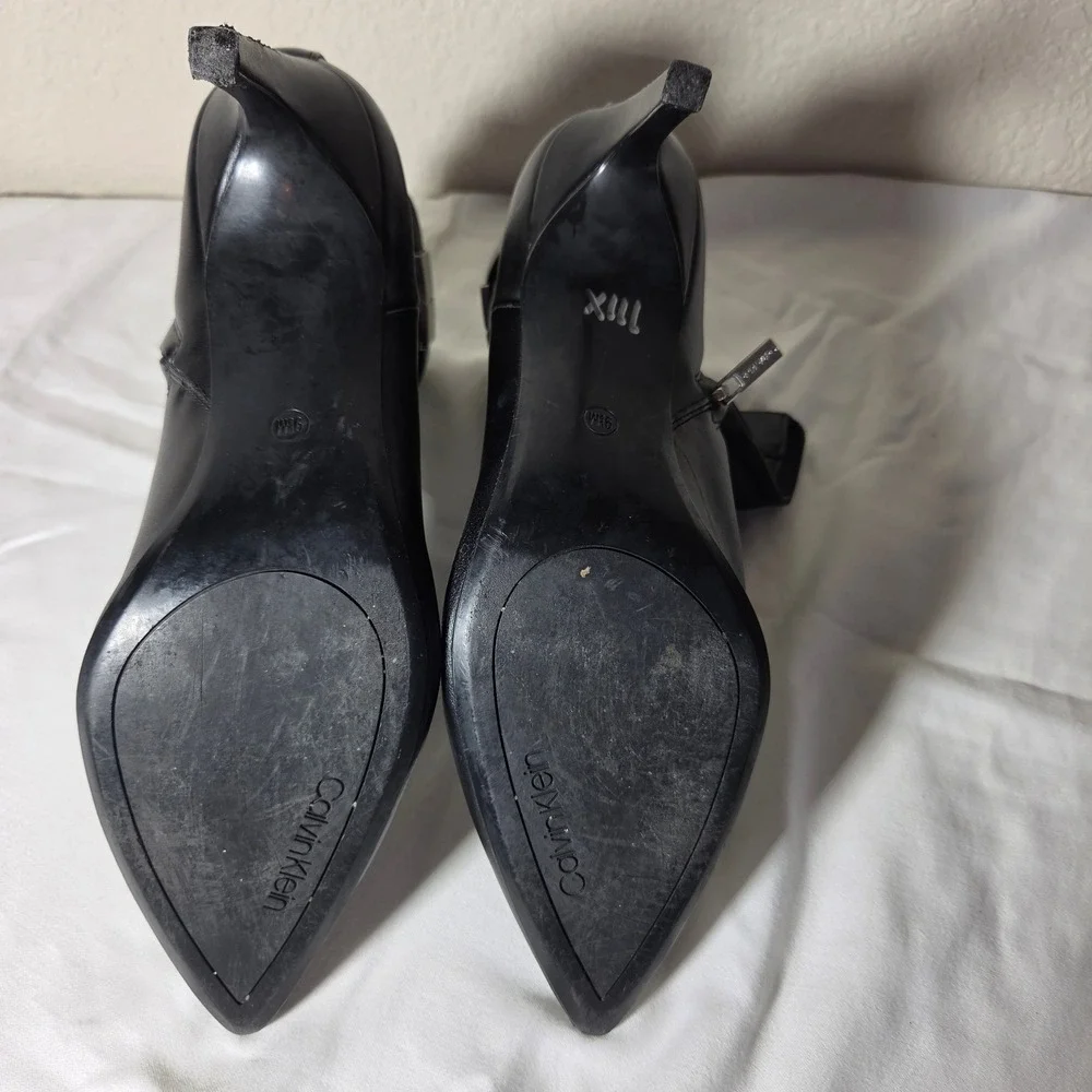 Calvin Klein Black Leather Pointed Toe Ankle Boots Silver Logo Hardware W9.5M