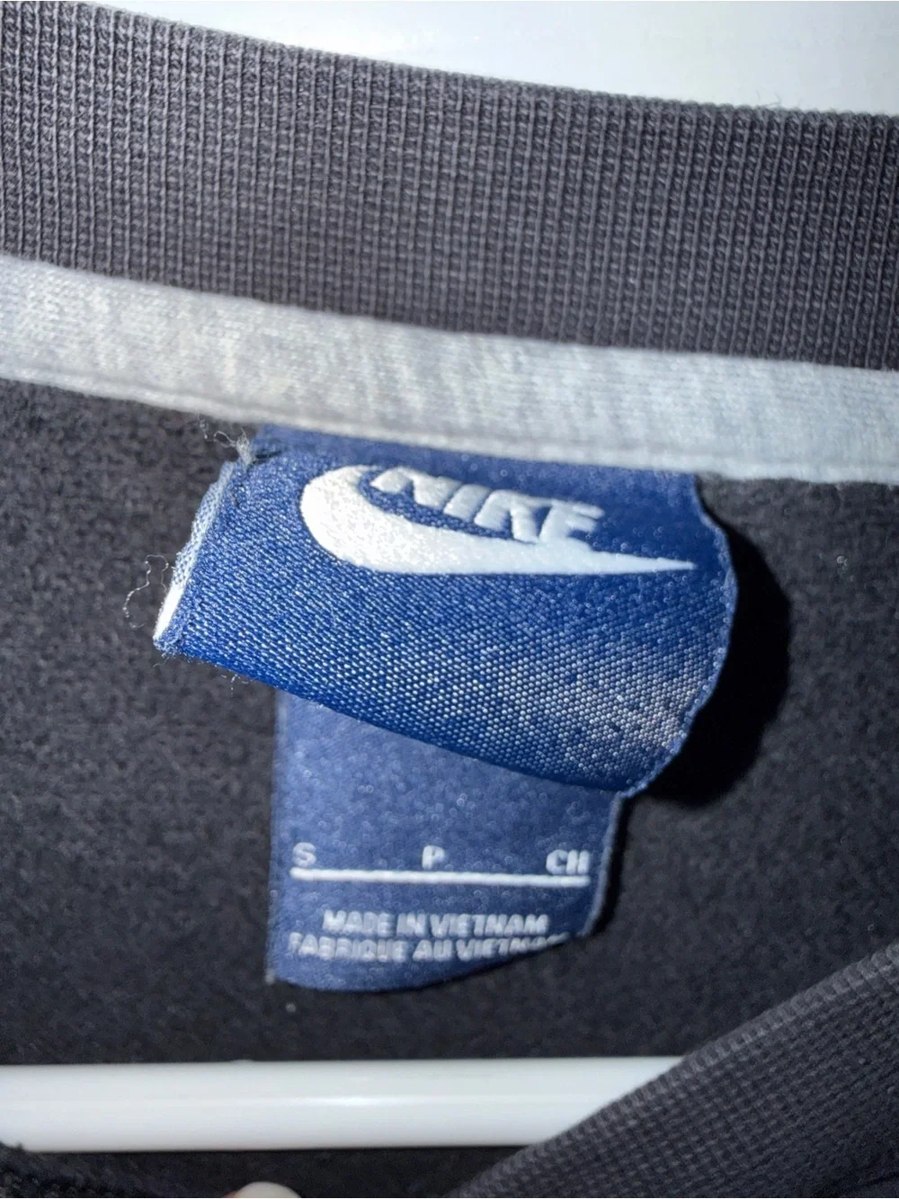 Nike pullover showing