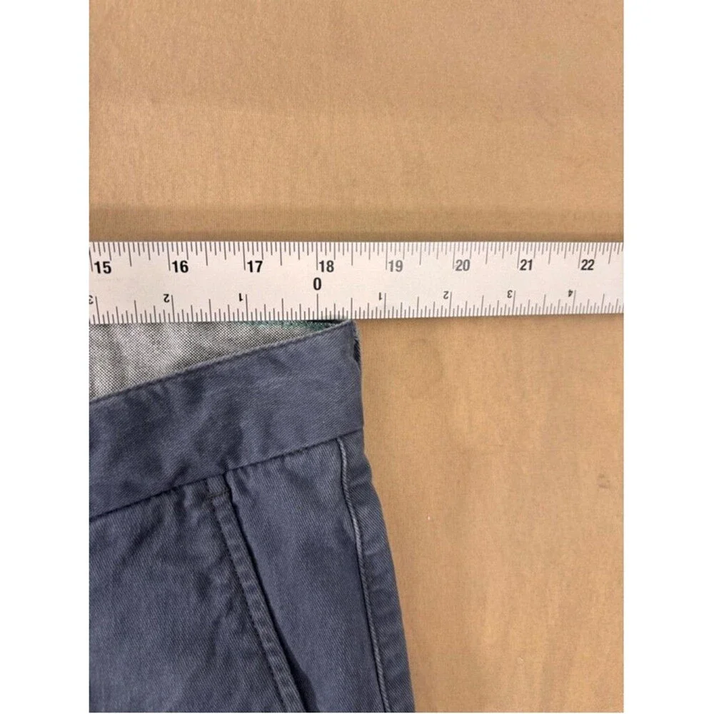 VISSLA tears button wear