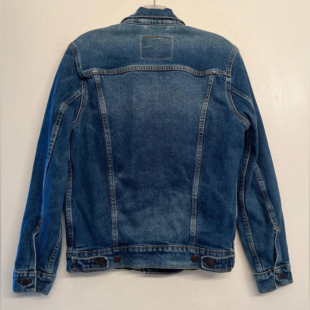 Levi's Trucker Jacket in a dark wash blue denim size S