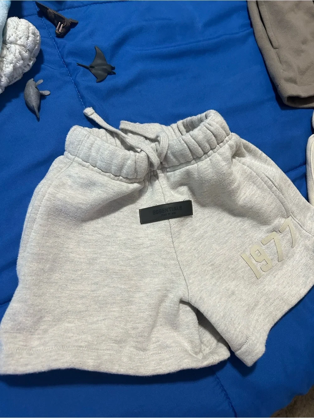 ESSENTIALS Kids Cream Fleece Shorts with Subtle '1977' Detail