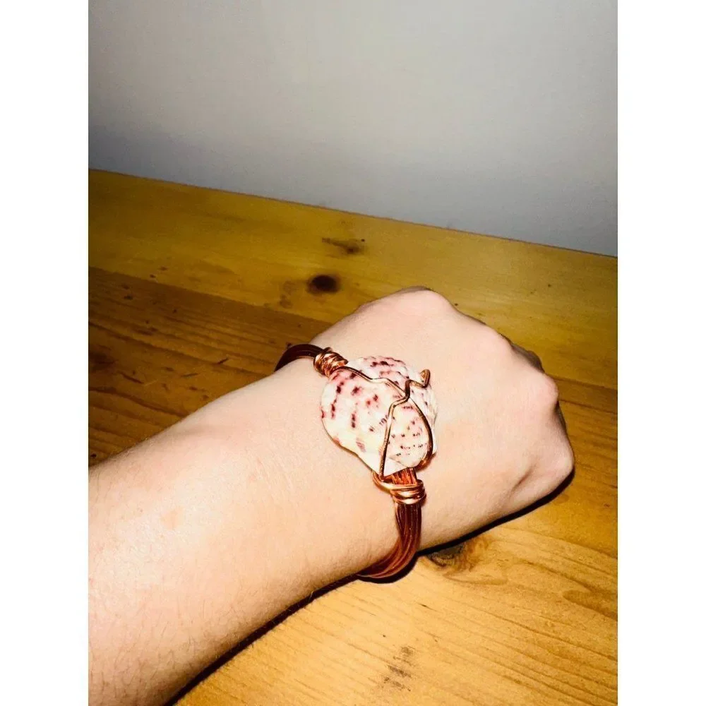 Handmade wrapped seashell