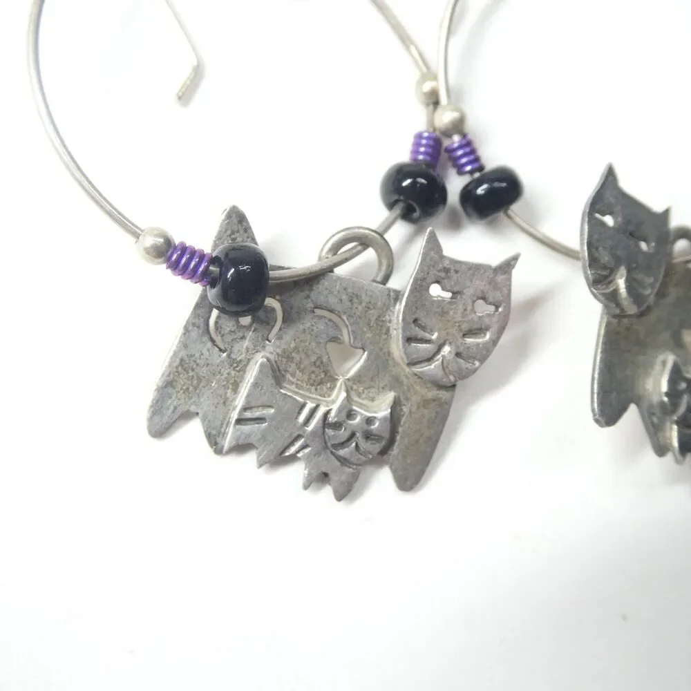 Far Fetched earrings featuring