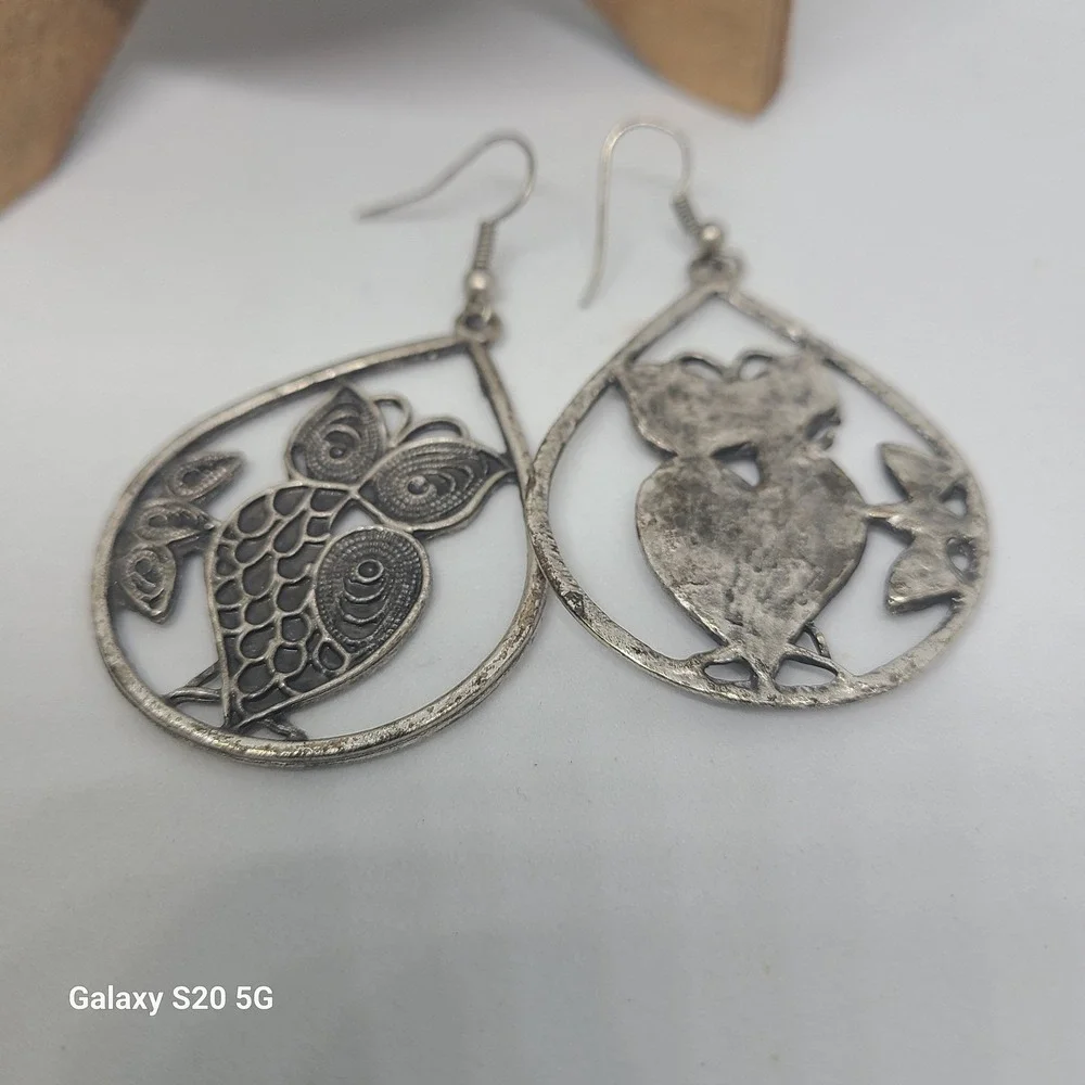 Source Unknown within earrings