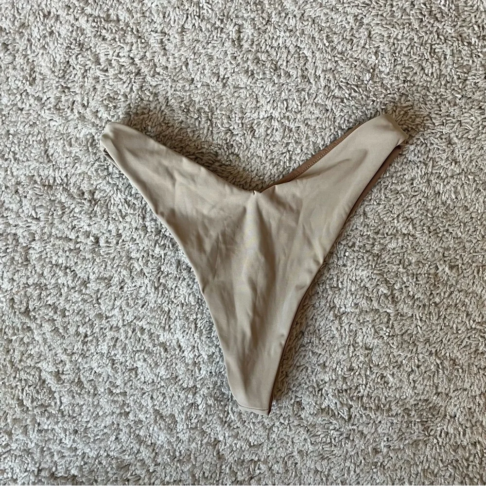 Tribe Kelley description tan