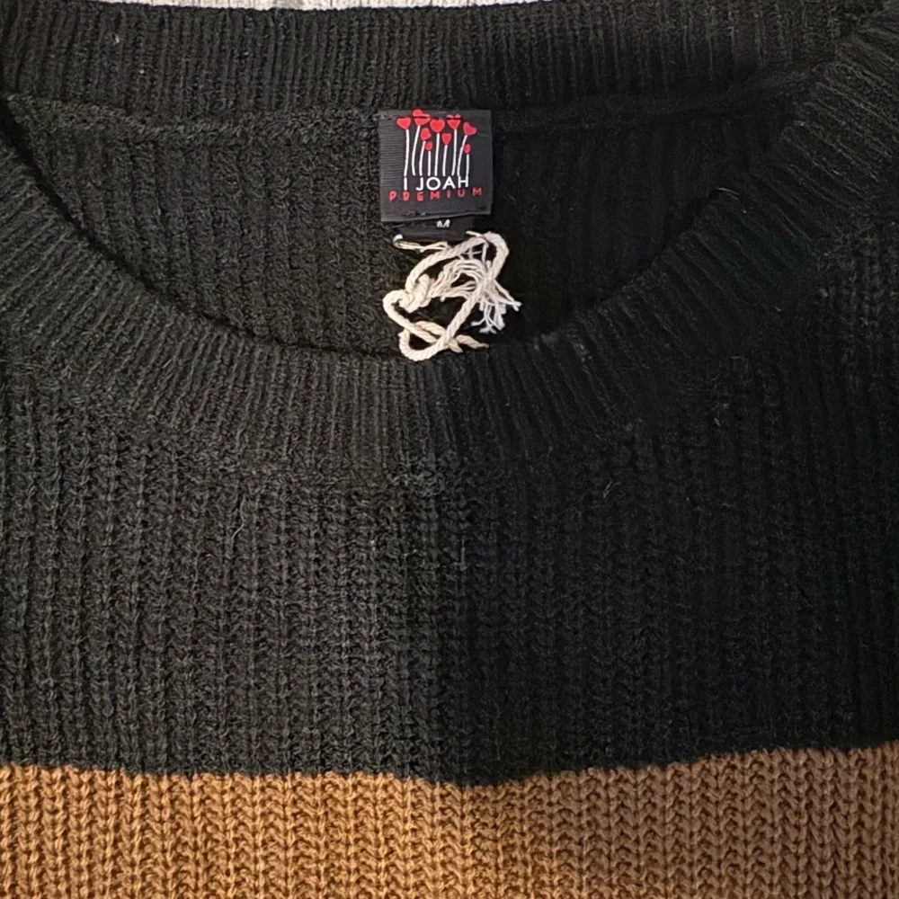 Classic Women's Crewneck Sweater in Black, Brown, and Cream