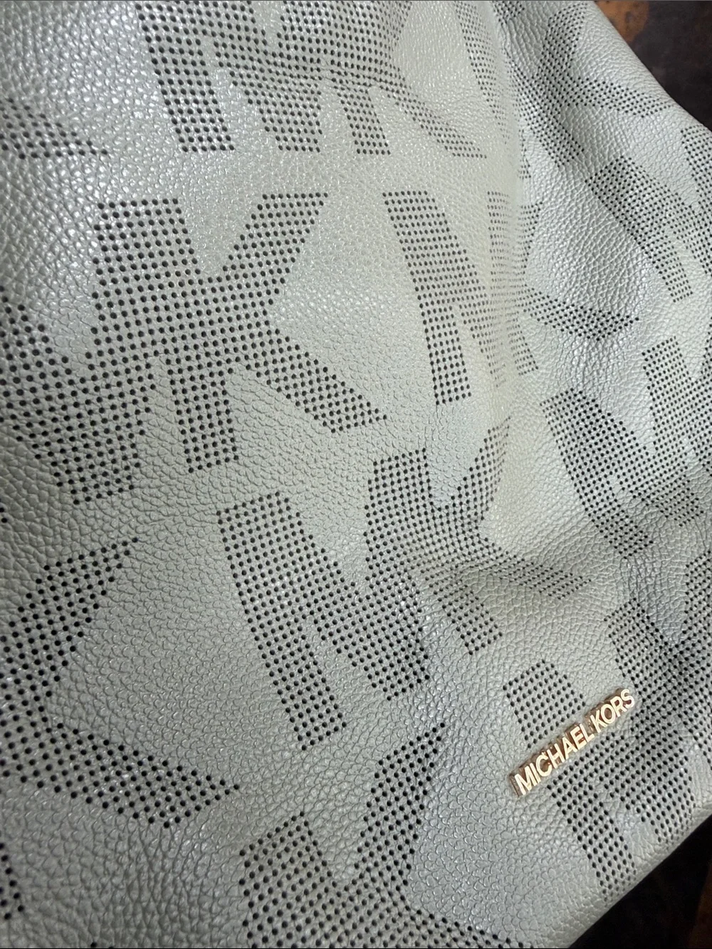 Michael Kors perforated mk
