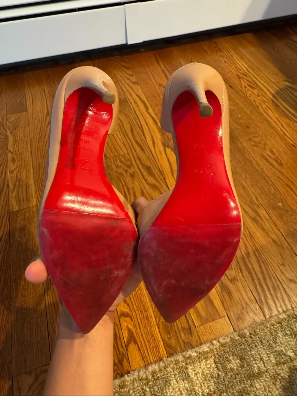 Christian Louboutin professionally half