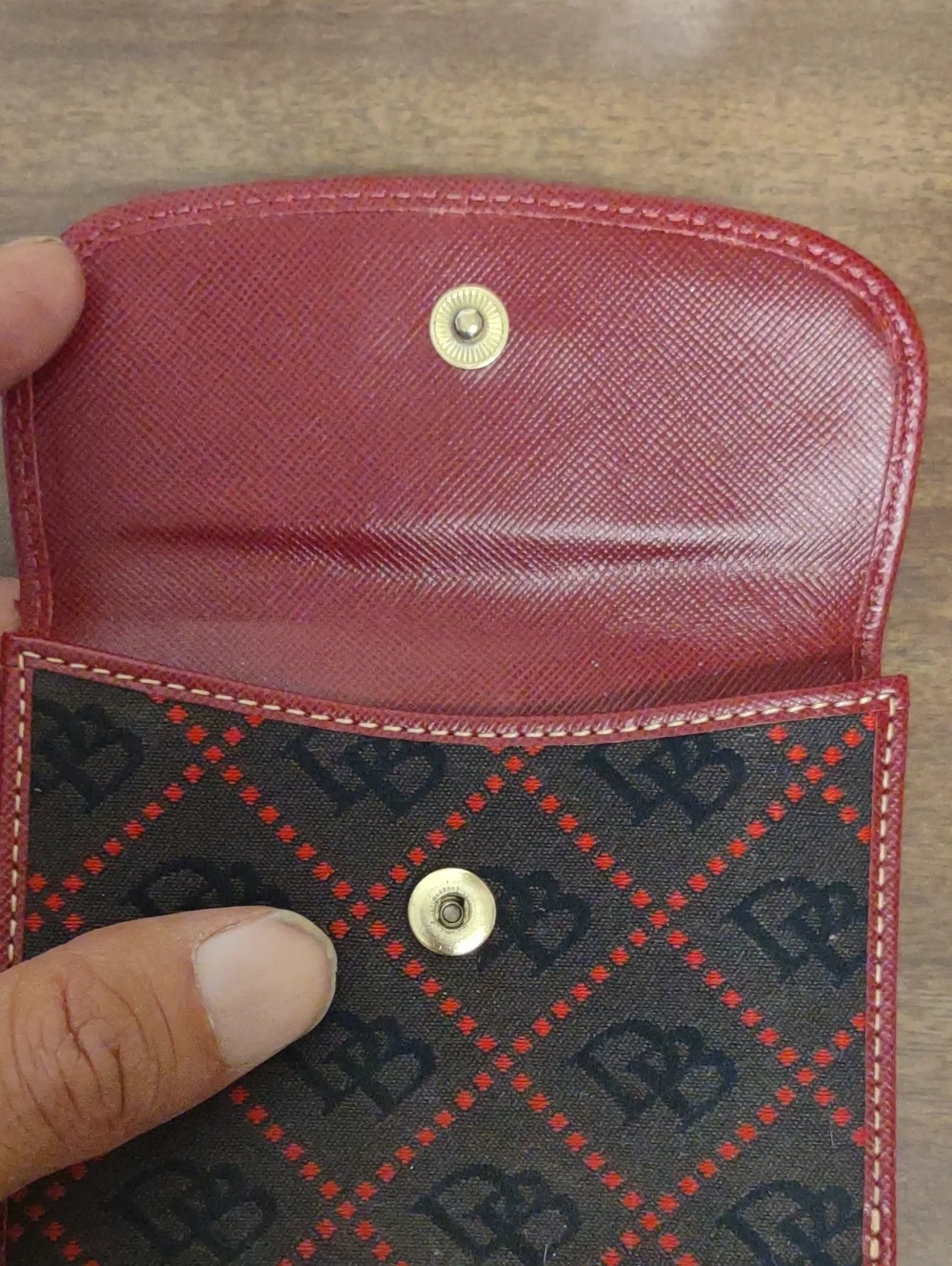 Dooney & Bourke compact men