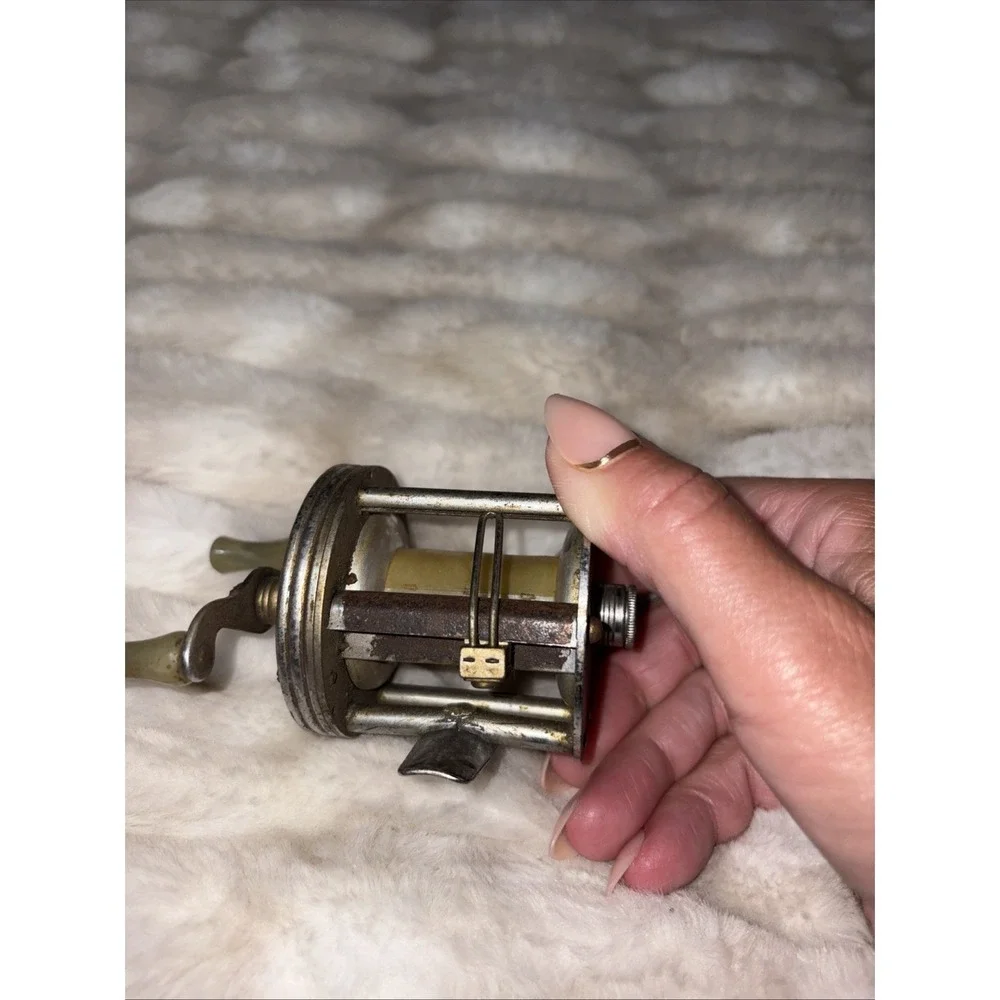 Vintage J.C. Higgins Fishing Reel Engraved Fisherman Fish Baitcaster 312.3184