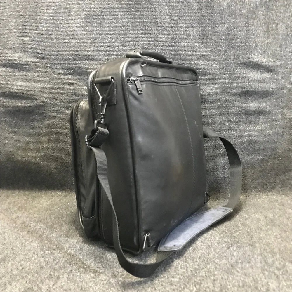 Tumi black leather