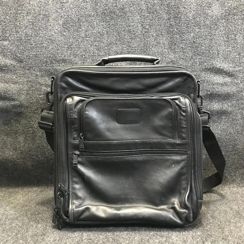 Tumi black leather