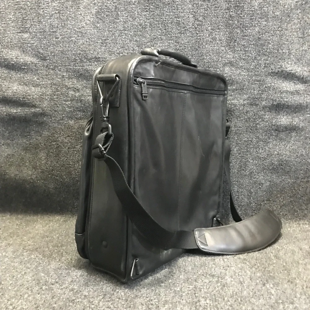 Tumi black leather