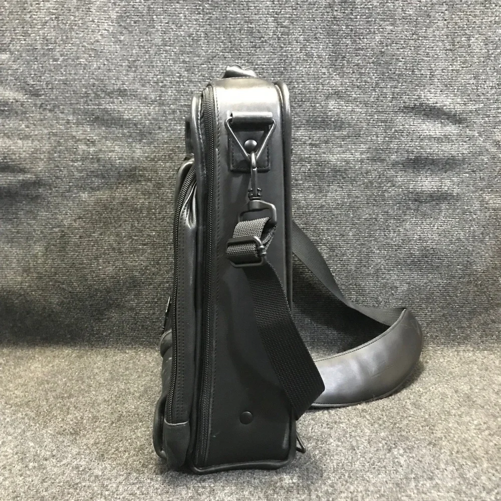 Tumi black leather