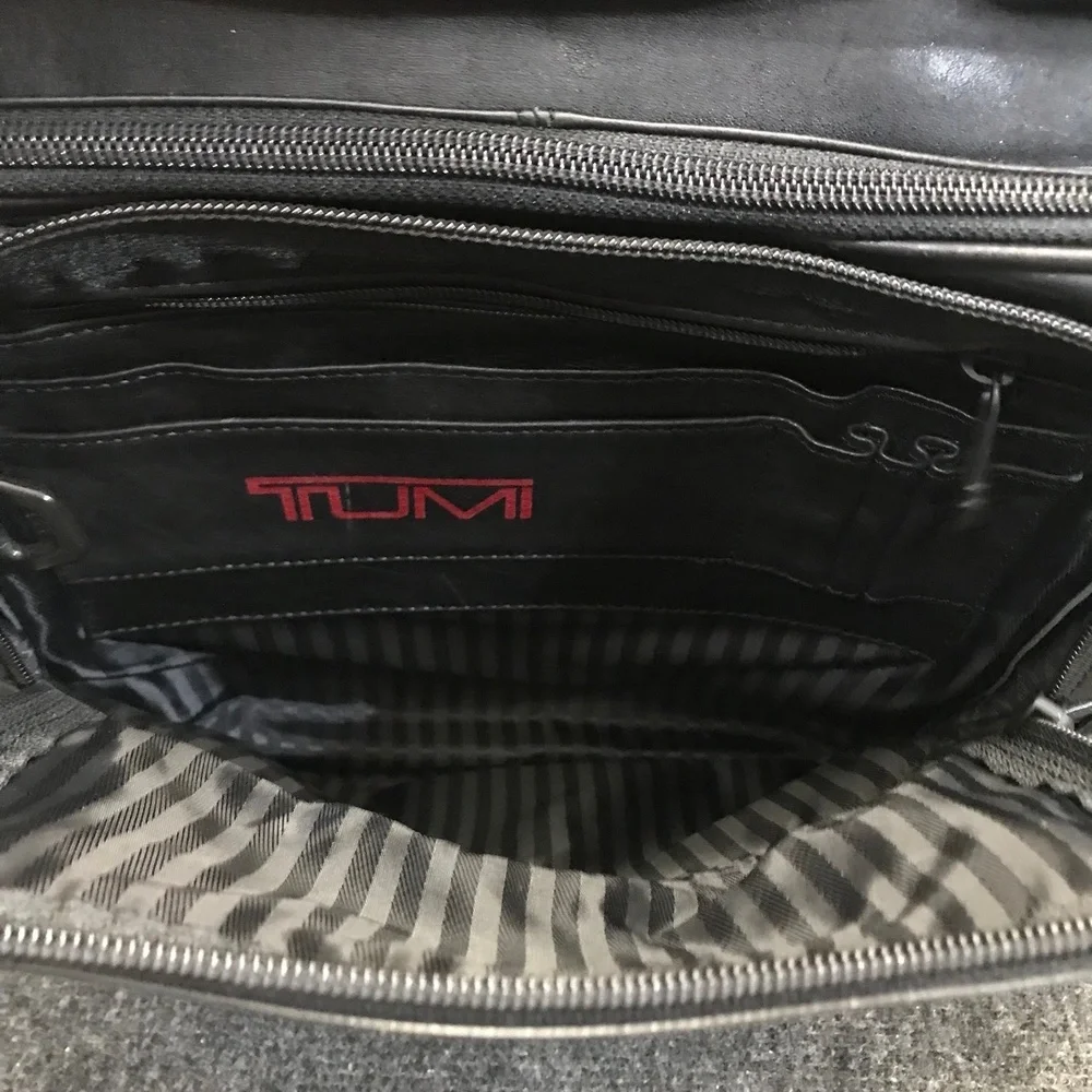 Tumi black leather