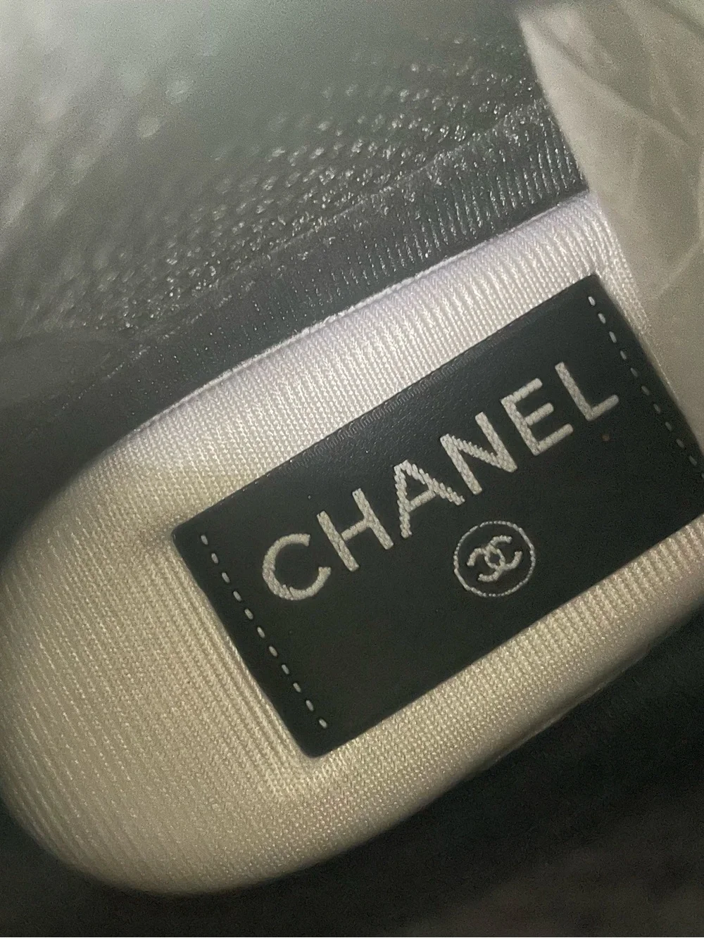 CHANEL White and Black Lace-Up Runner Sneakers