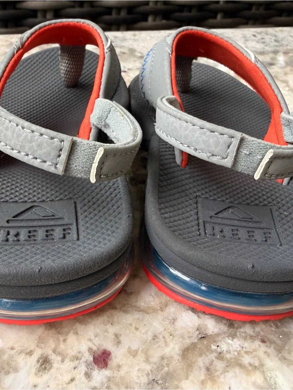 Reef Kids Grey and Orange Flip Flops with Yellow Logo