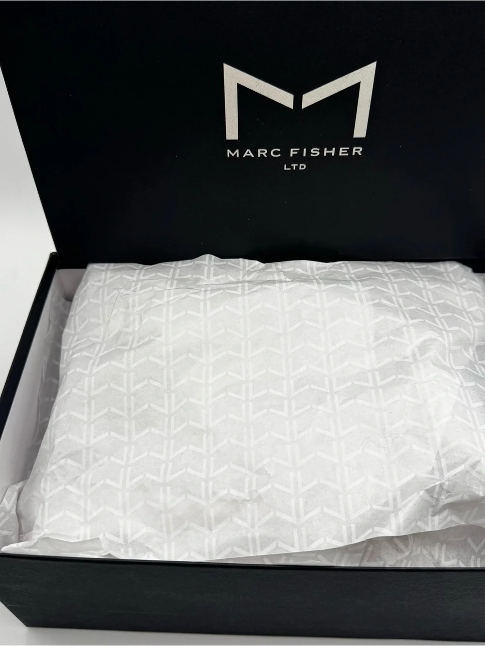 Marc Fisher new box