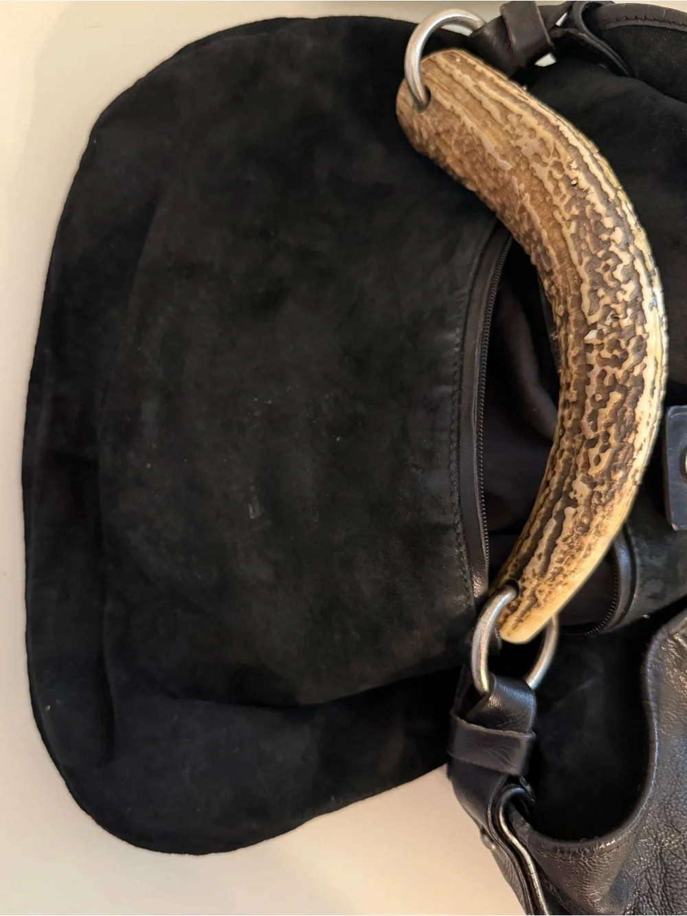 Yves Saint Laurent snap details sits