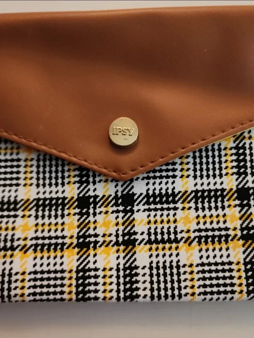 ipsy yellow black