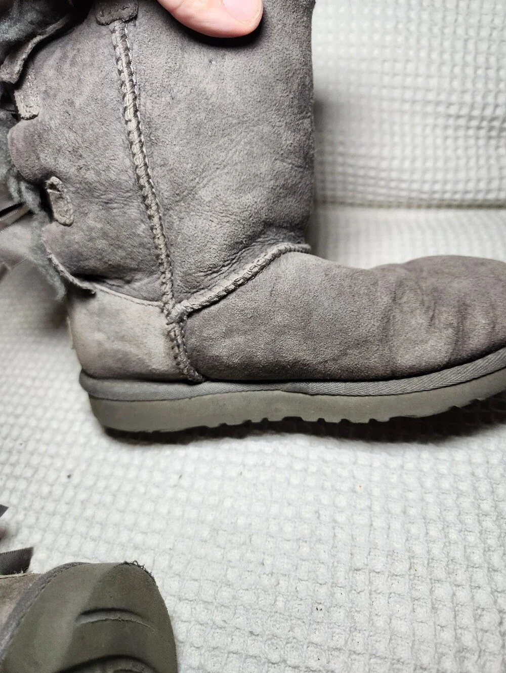 UGG Gray Bow Back Shearling Boots Flawed