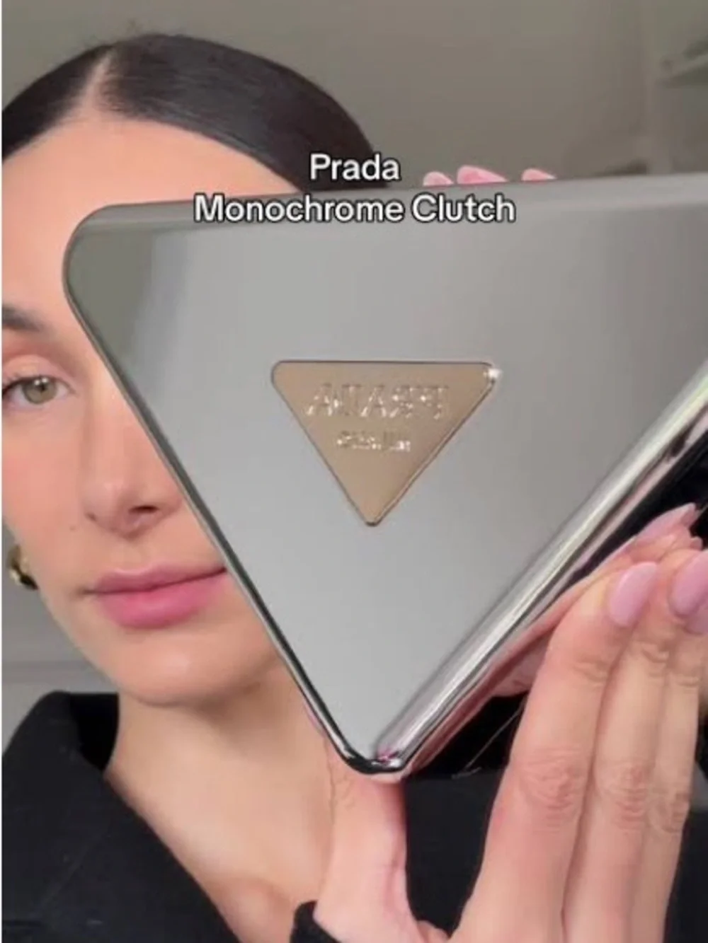 Prada triangular clutch