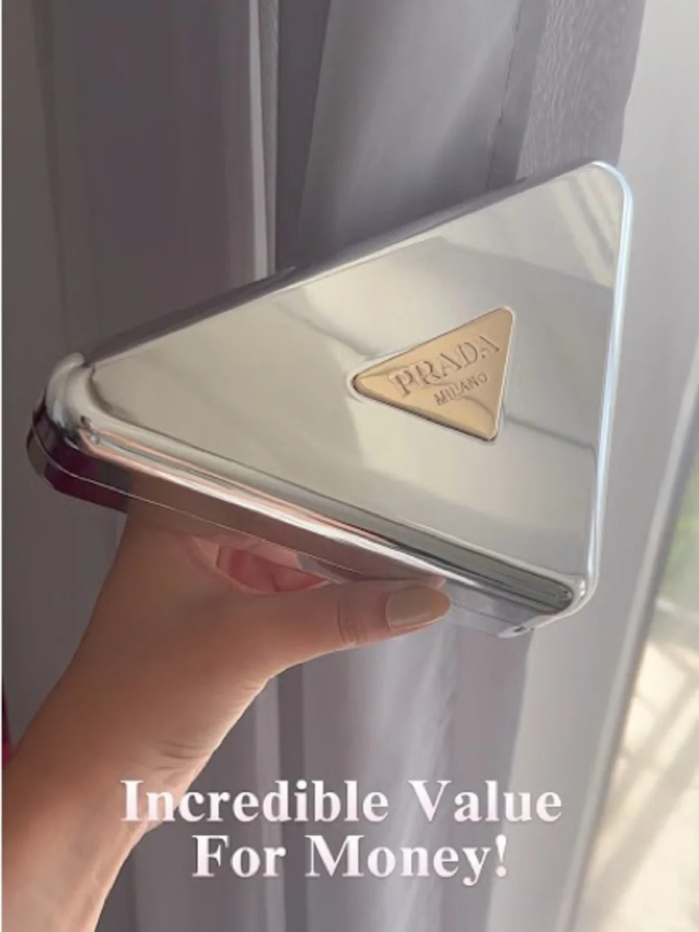 Prada triangular clutch