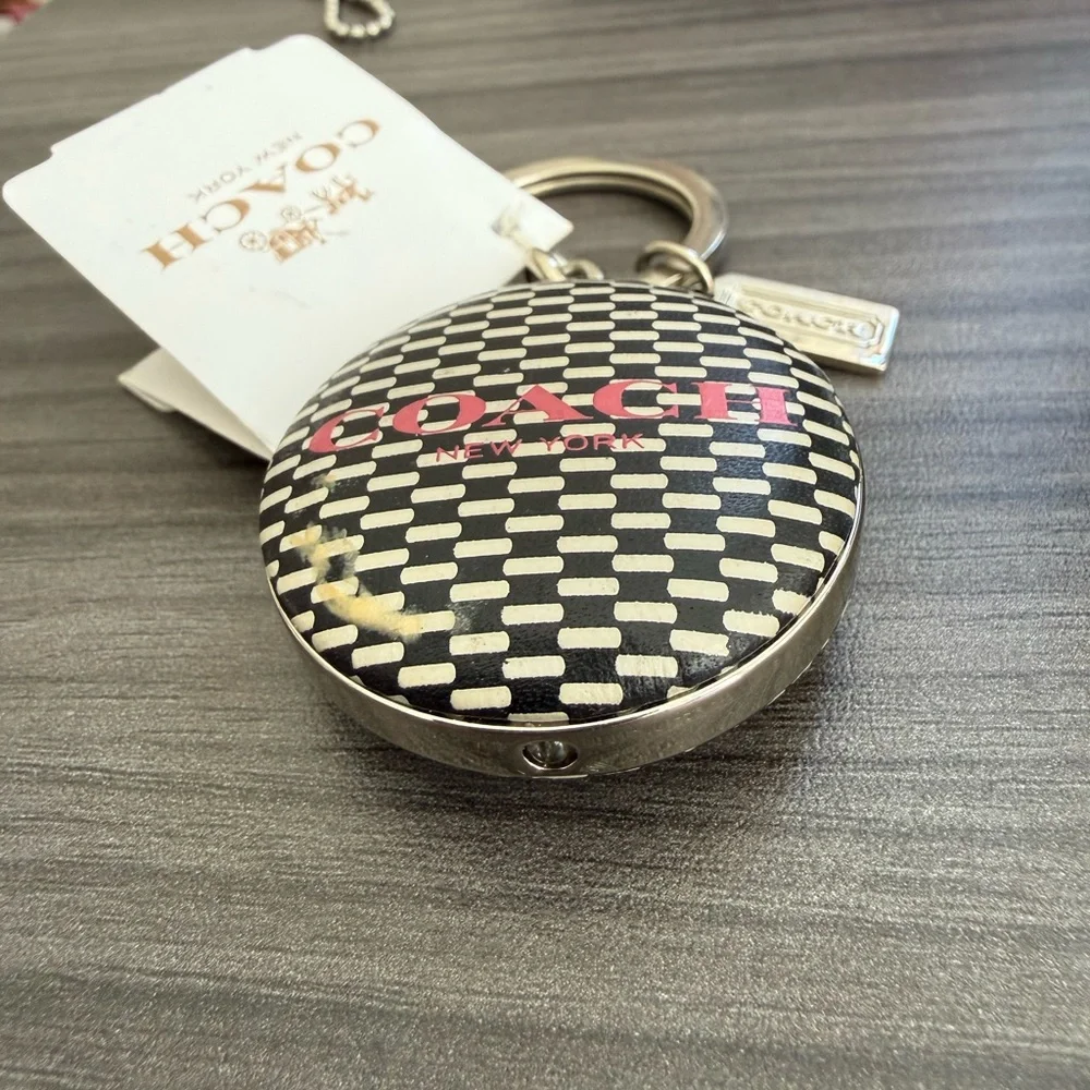 Coach flashlight keychain