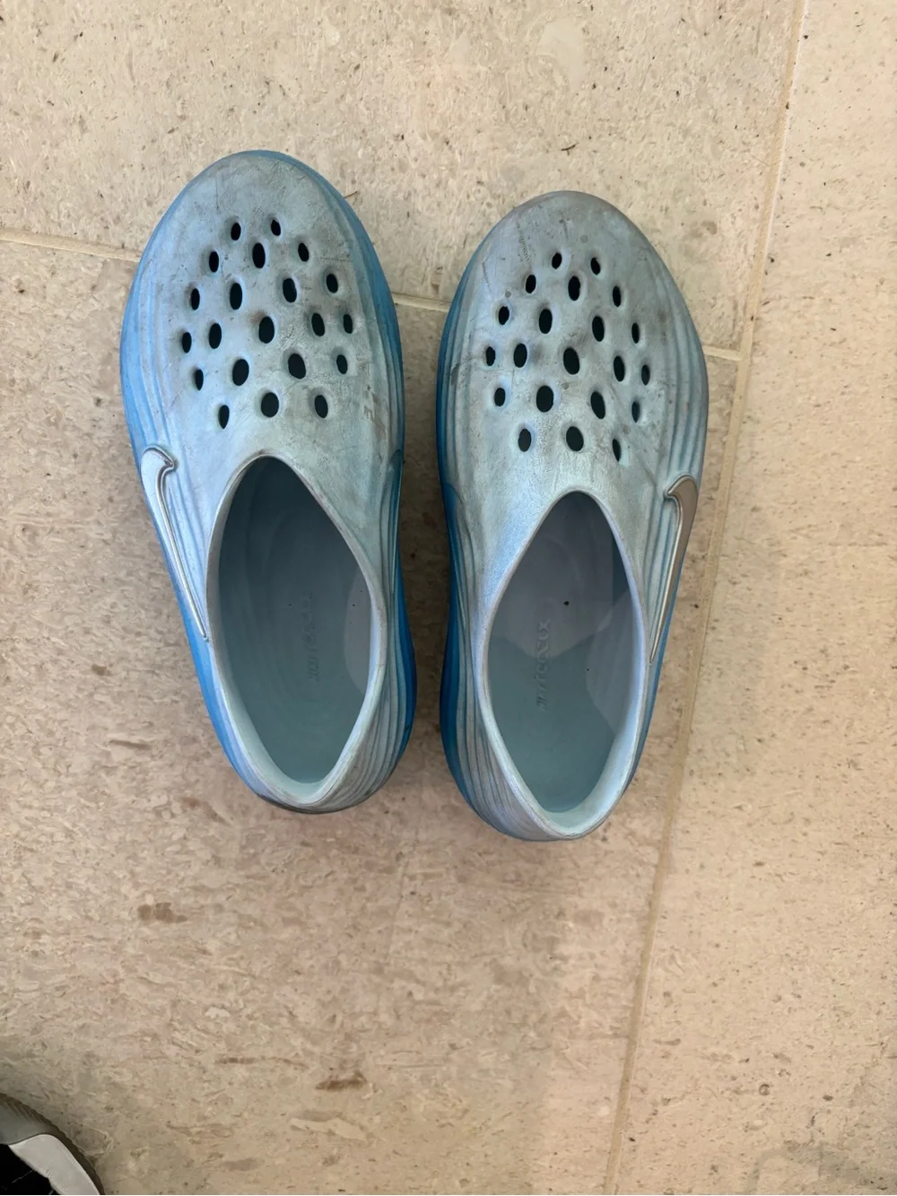 Nike boys Glacier Blue Slip-On Sandals with Silver Swoosh