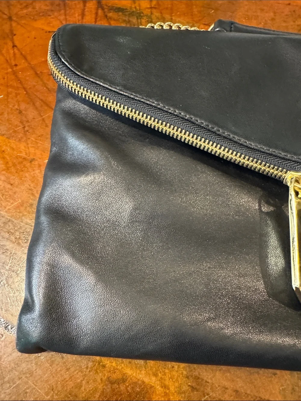 henri bendel Black Leather Fold-Over Clutch with Gold Chain