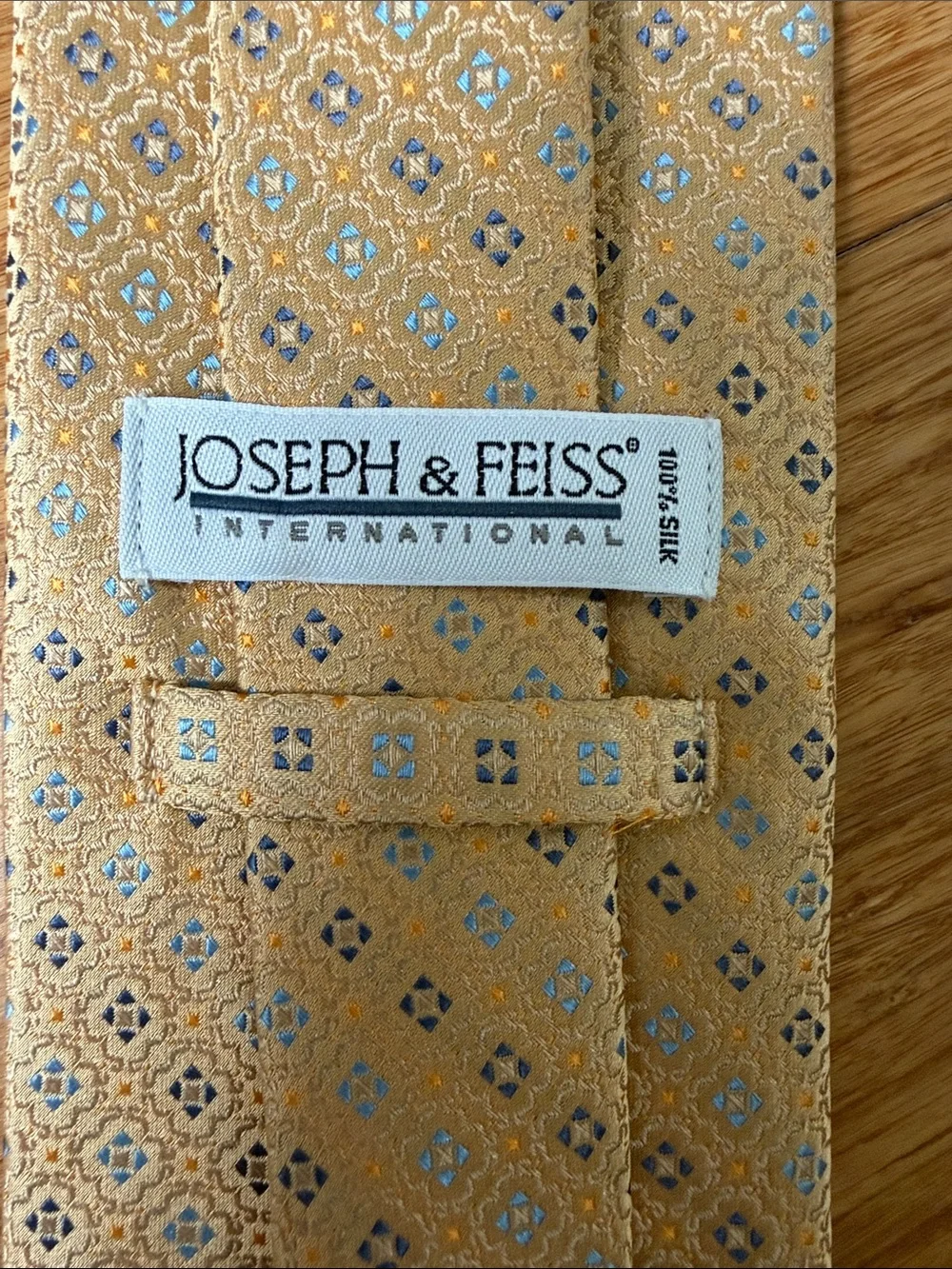 Joseph & Feiss elegant gold