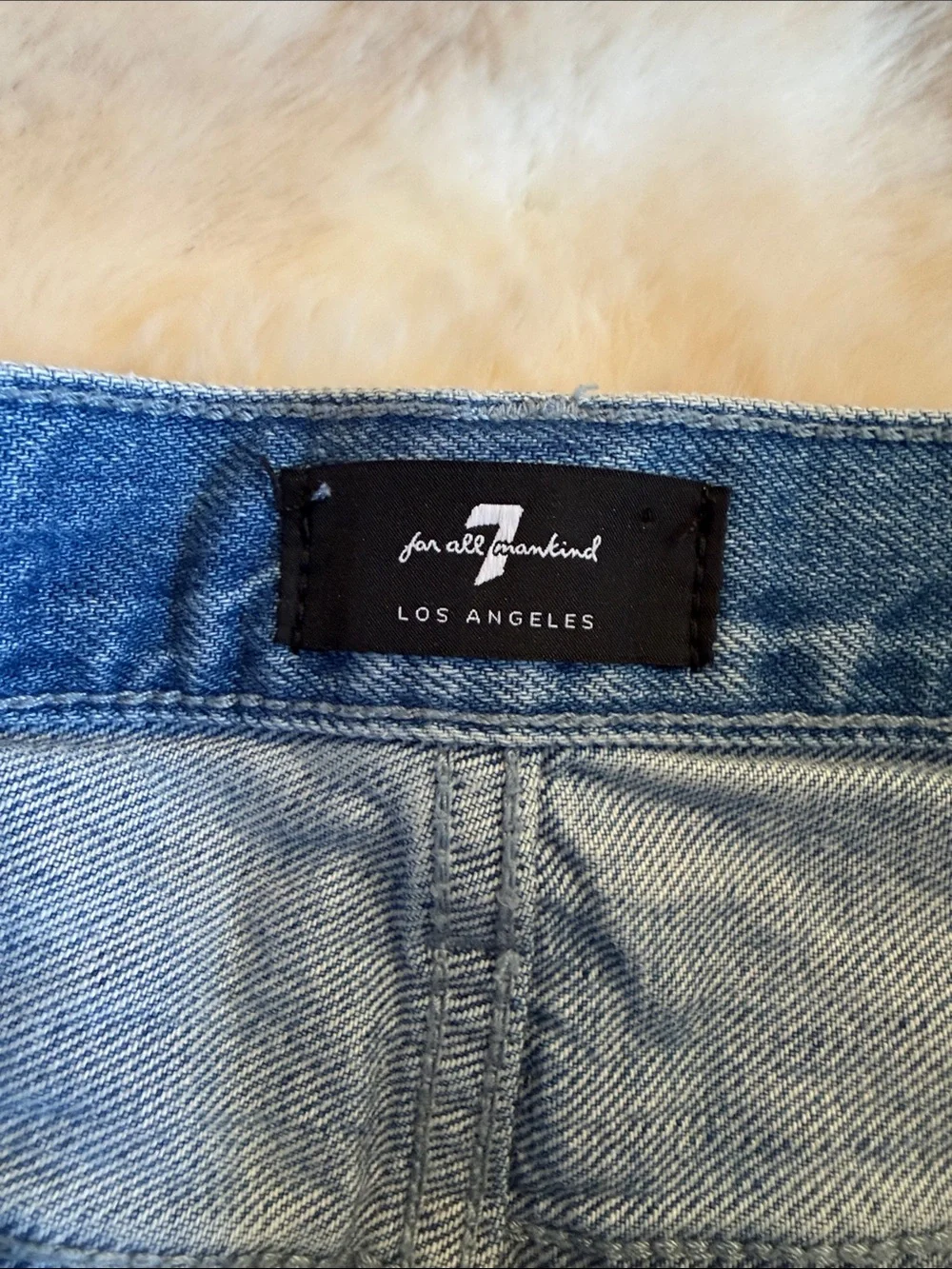 7 for all mankind denim mini skirt distressed hemline light wash size 29