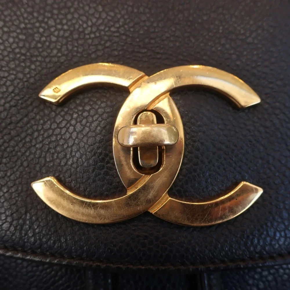 Authentic CHANEL black caviar leather backpack